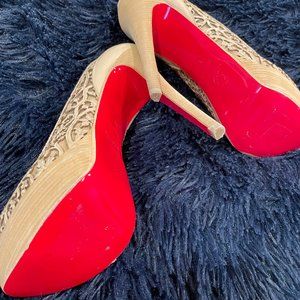 Louboutin beige pumps